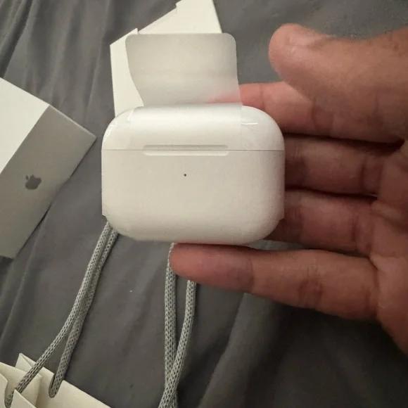 Apple AirPods Pro with White Shopping Bag